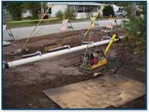 Area being worked on with pipes and wood